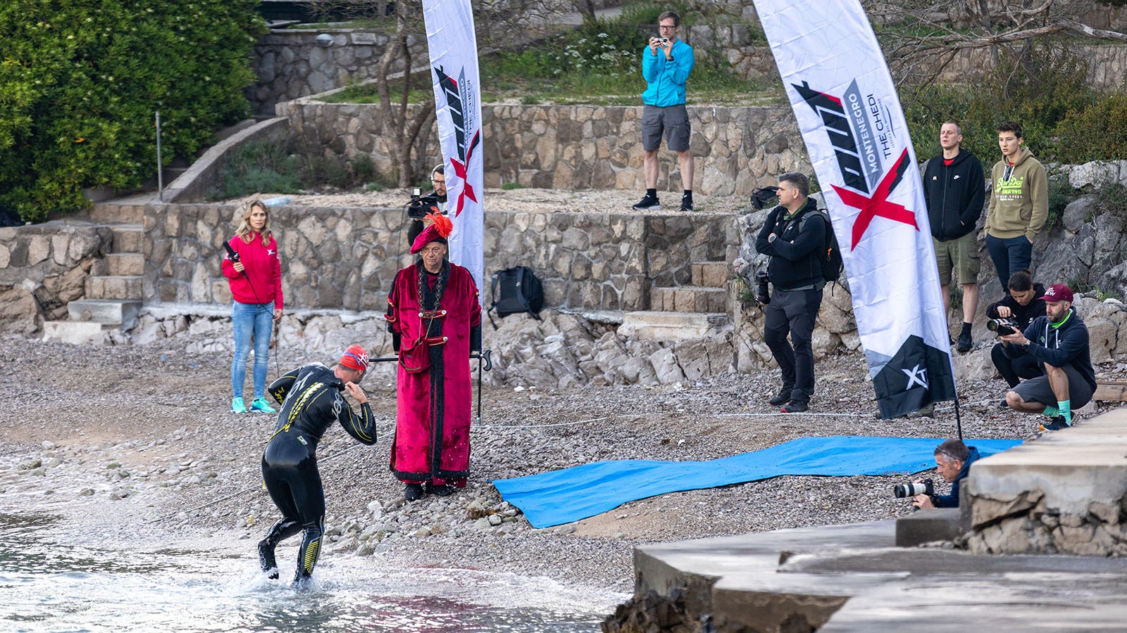 The executioner stands on the beach ready to ax the slowest swimmers in the X-Out Extreme Triathlon. Steve Bang wasn't one of them.