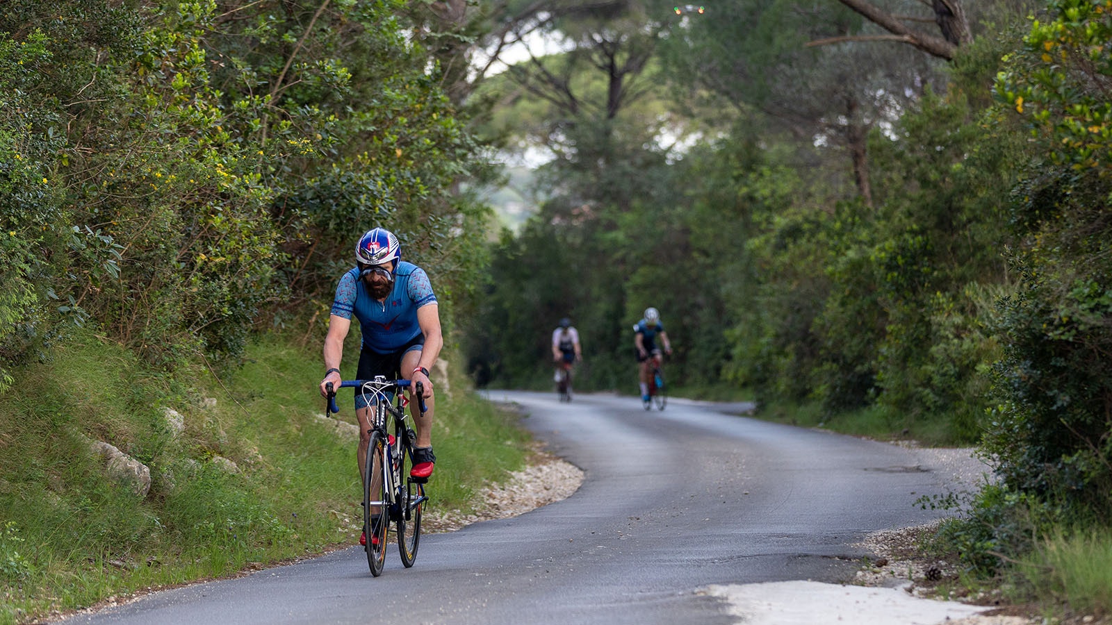 Steve Bang pushing the crest of one of the smaller climbs on the course.