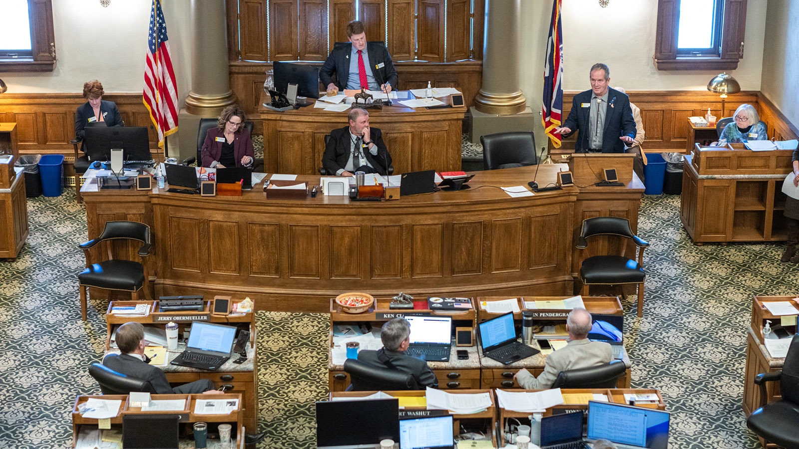 Rep. Steve Harshman, R-Casper, right, addresses the Wyoming House on Tuesday during debate on his House Bill 203, which died.