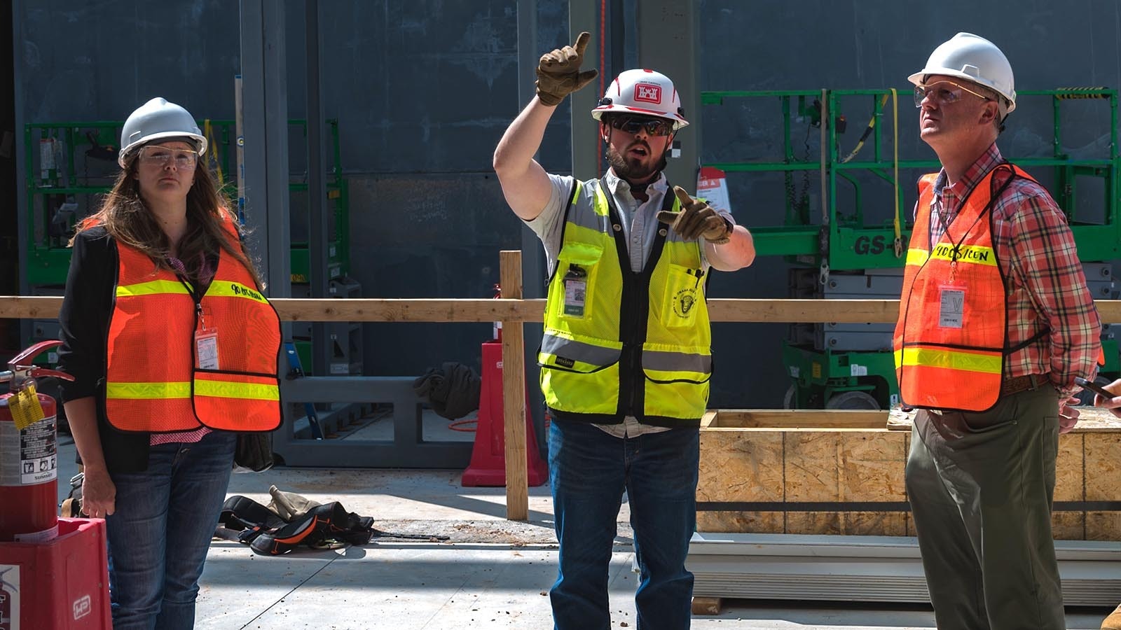Steven Kravitsky, center, talks about construction work at F.E. Warren Air Force Base in preparation for Sentinel nuclear missiles.