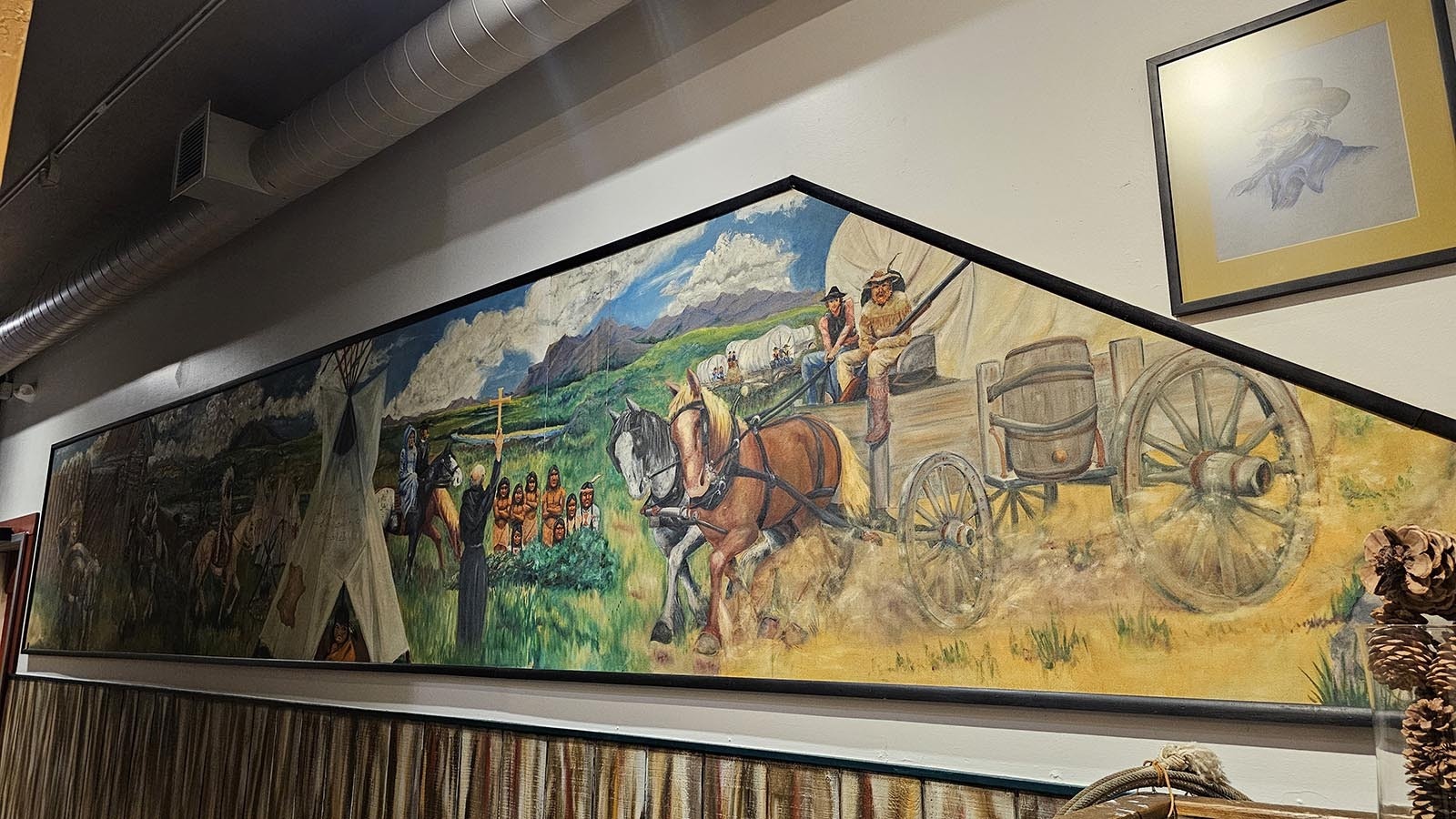 Buck Buchenroth found this depiction of the Green River Rendezvous in a barn in pieces. He put it back together again and brought it to Stockman's Saloon and Steakhouse.