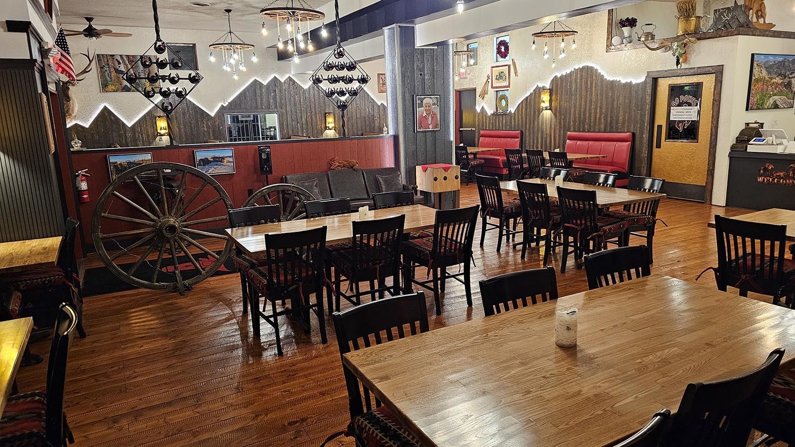 The restaurant's walls are decorated with mountains crafted from wood. The far wall to the right in particular depicts one of Buck Buchenroth's favorite mountains to climb.