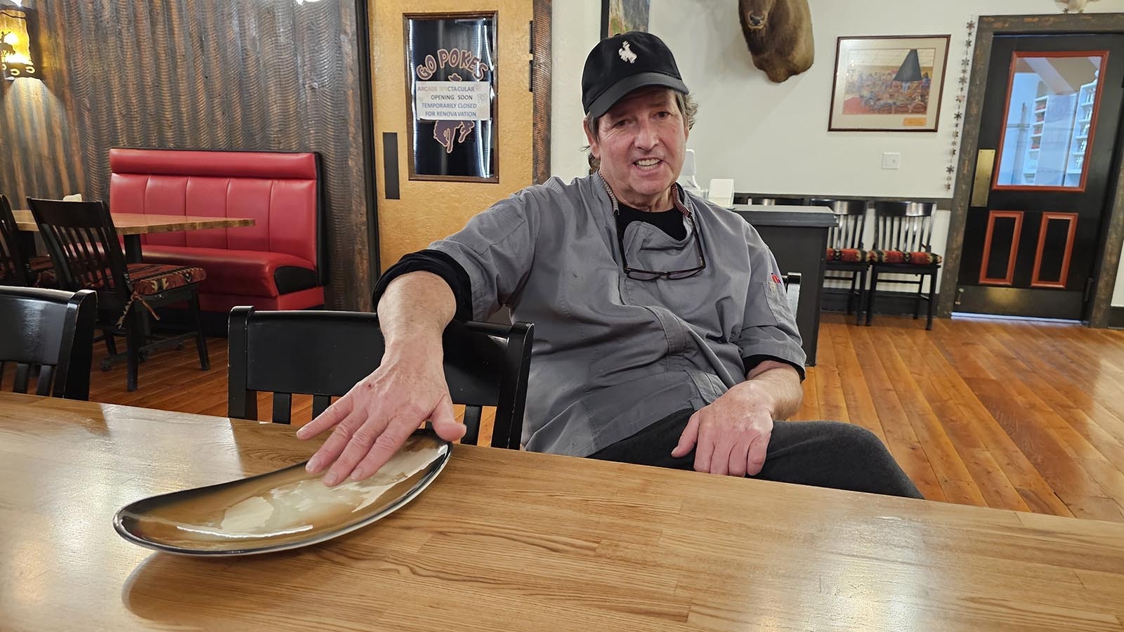 Buck Buchenroth with one of the custom dishes he designed for Stockman's Saloon and Steakhouse.
