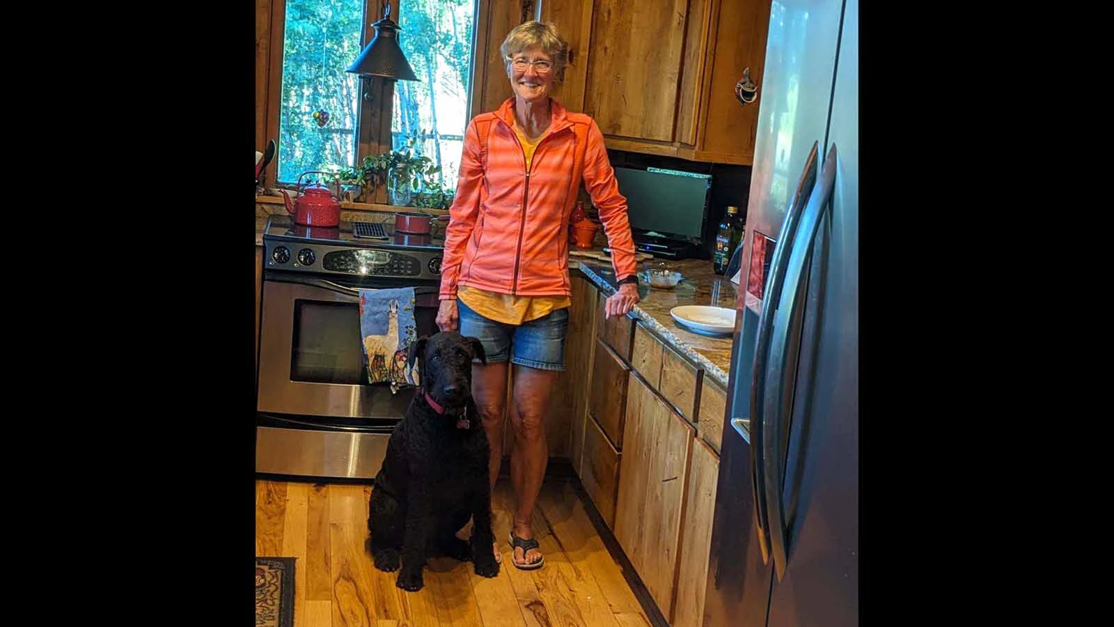 Laura Lee Nelson with her Airedale, Lucy, who spends a lot of time with customers at Stone Drug in Jackson.
