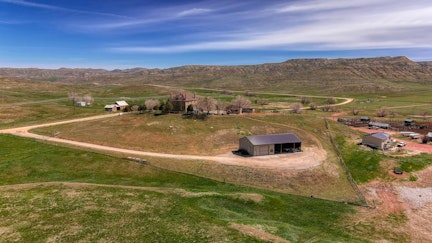 Built in 1898, The Stone House near Sheridan has survived droughts, booms and busts, the Great Depression, and Prohibition. Now a historic preservation district wants to protect its stone walls and prairie views.