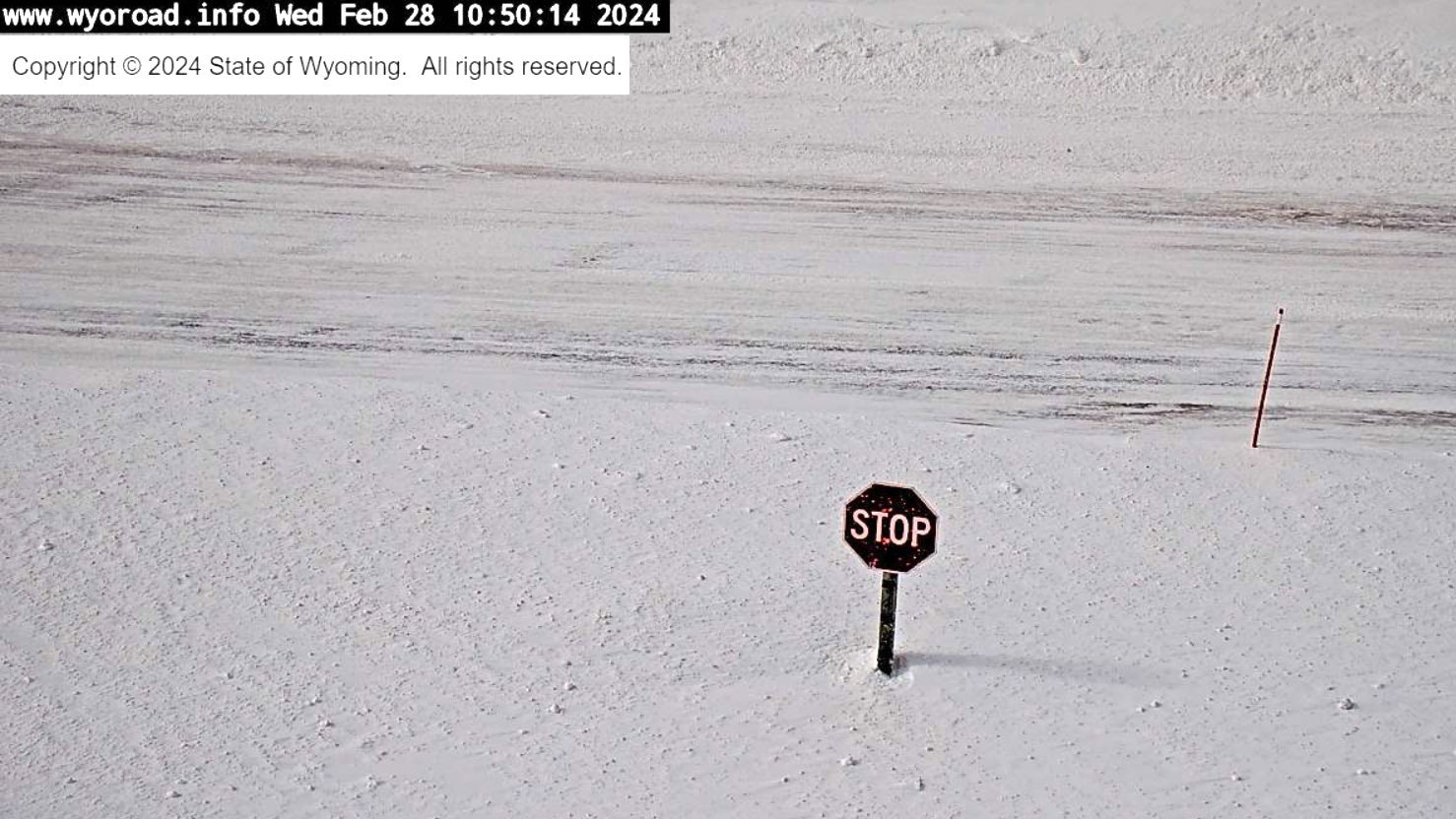 Now had reached about halfway up the stop sign by Feb. 28, 2024, in last winter's Stop Sign Challenge. The snow didn't make it over the top.