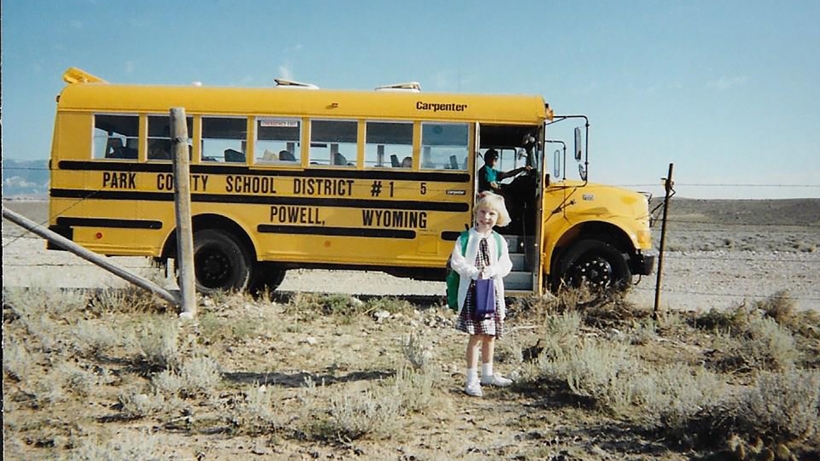 Cathy Ringler’s daughter Ashley getting off the school bus in Clark, Wyoming. Ringler is a cowgirl and storyteller who was inspired to write by her daughters and students about their adventures in Park County.