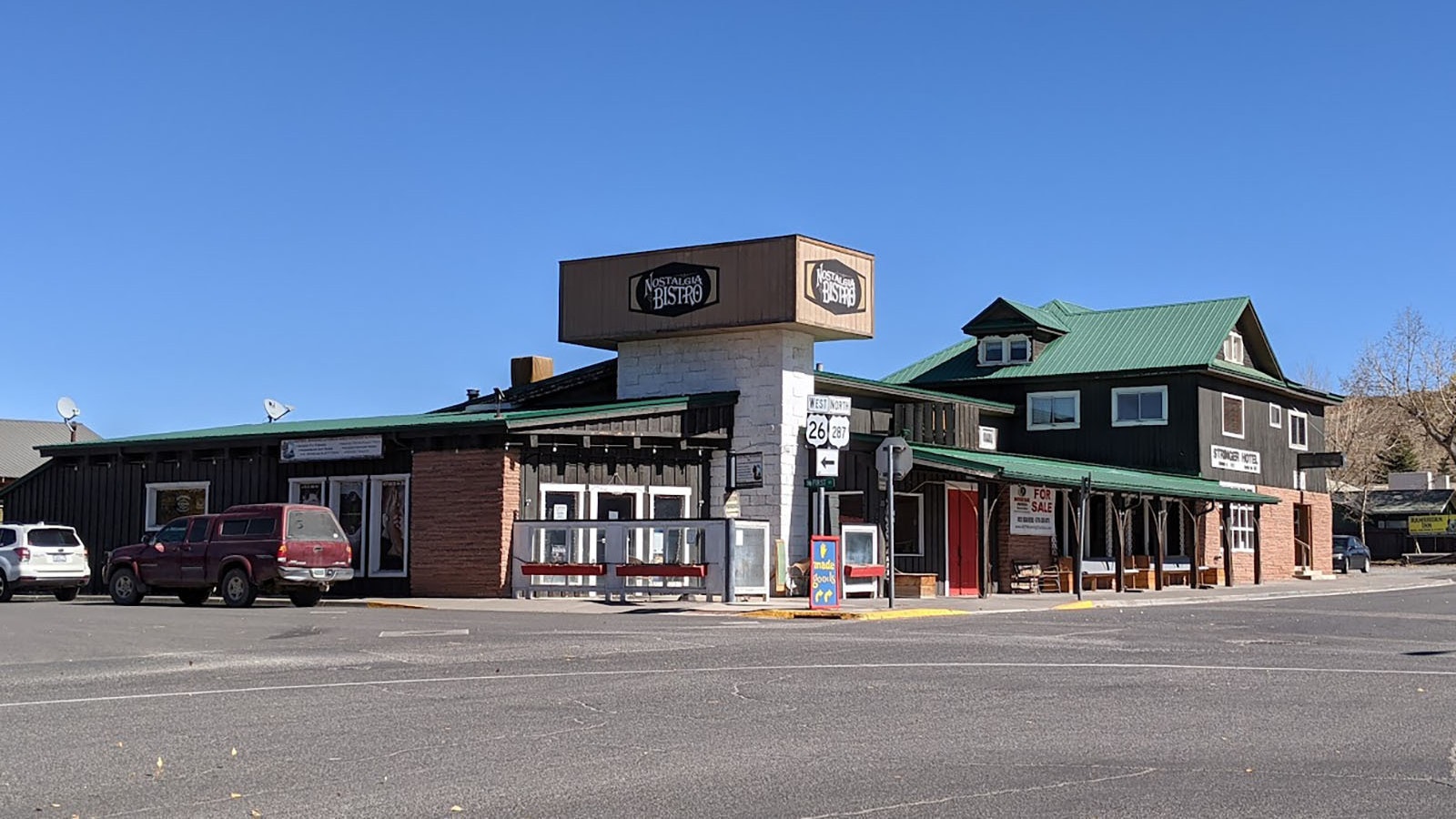 The historic Stringer Hotel has been added to over the decades and now takes up an entire block. The original building is at the right and is a restoration work in progress, while retail and cafe space is open in the other parts of the complex.