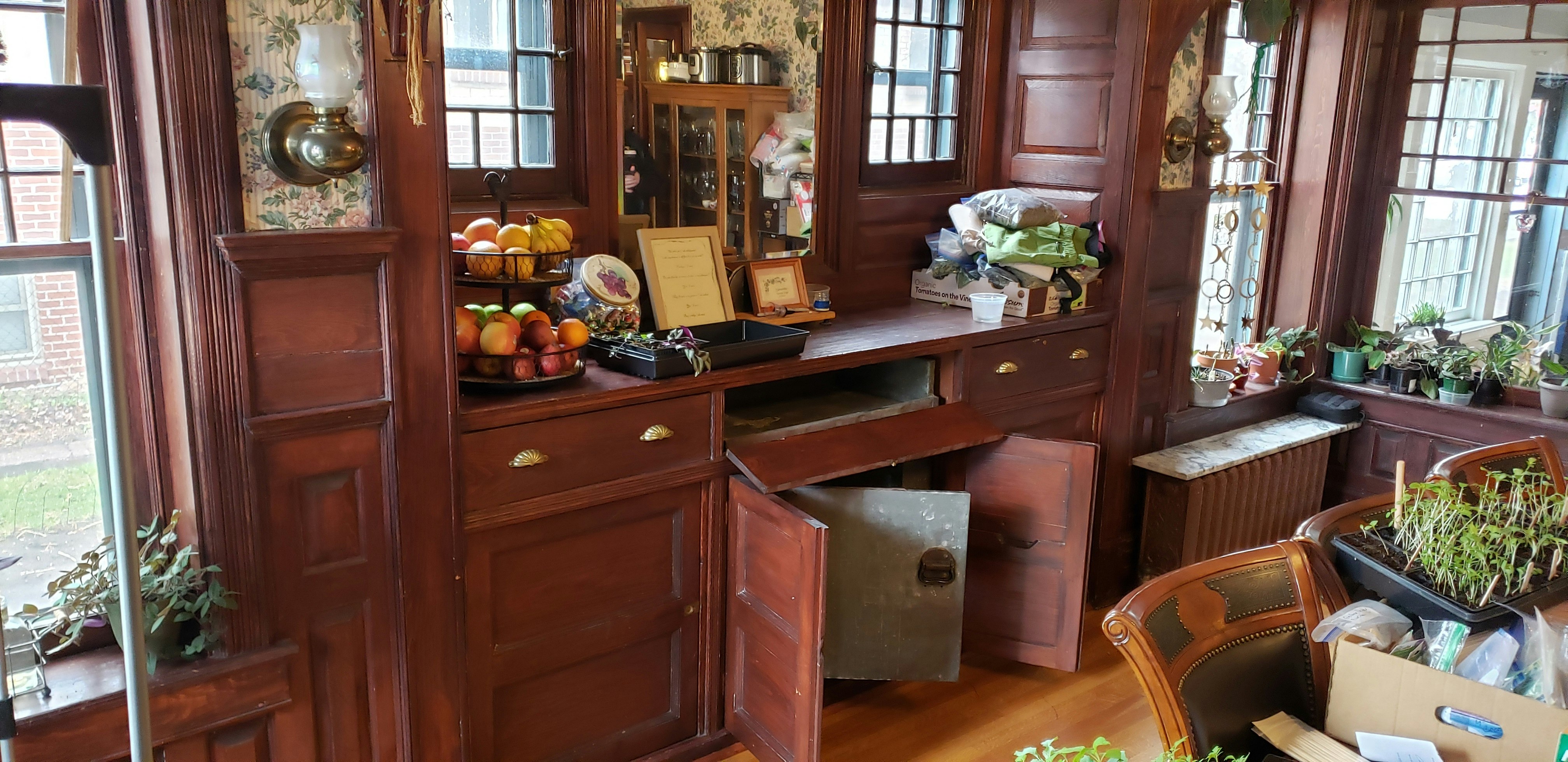 This buffet features an old-style icebox in the center to keep foods and wine cold.