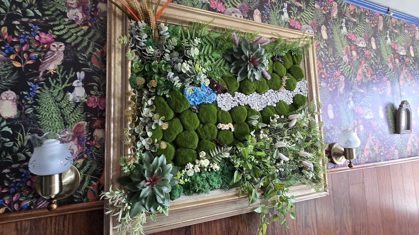 The Enchanted Room in the Sturgis Mansion includes a picture frame filled with living moss.