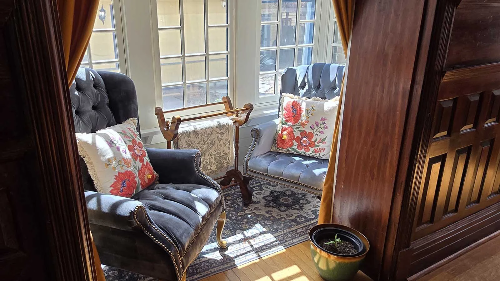 A sitting area, perfect for enjoying an early morning cup of coffee at the Sturgis Manor, which now houses a craft retreat called Hollowberry Manor.