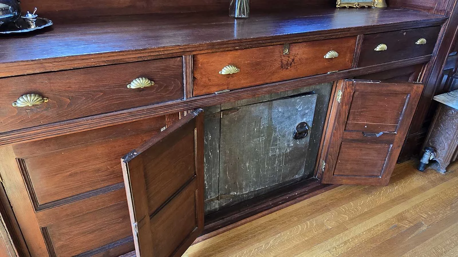 Historical items and details have been retained throughout the Sturgis Mansion, which has been redecorated for a craft retreat called Hollowberry Manor.