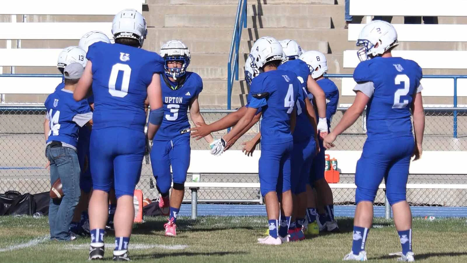 The Upton Bobcats took the field for the first time on Thursday night, sporting new blue-and=white jerseys.