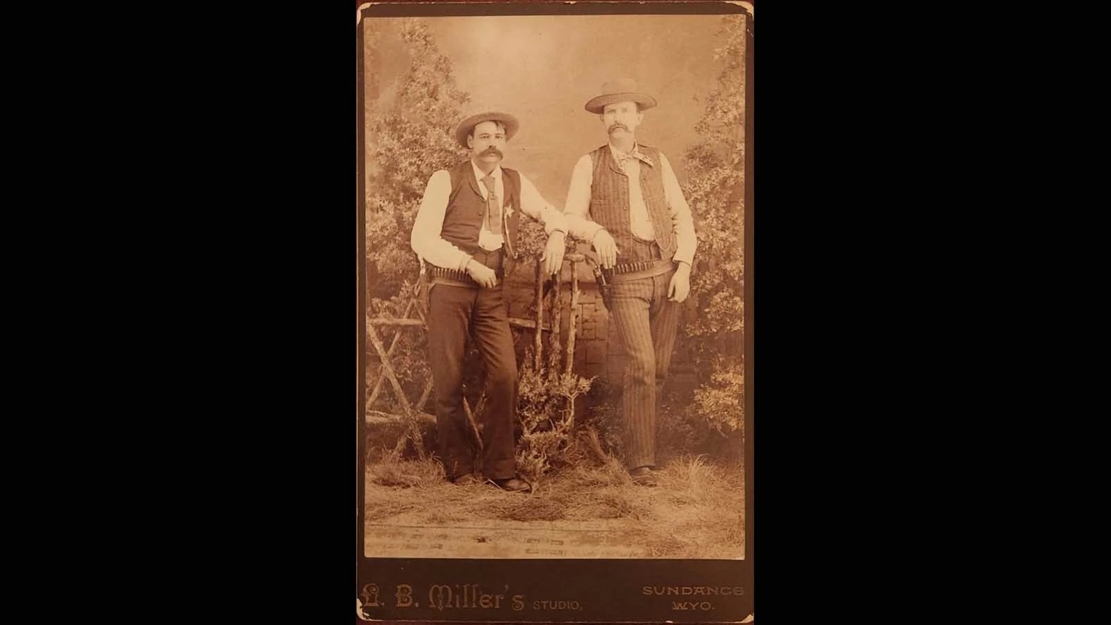 Jim Swisher and E.B. Armstrong had a warrant to arrest Buck Hanby when Swisher shot and killed the accused outlaw in his home at Salt Creek. Harry Longabaugh aka the Sundance Kid was a friend to Hanby and witnessed the shooting which he claimed in his testimony was unlawful.