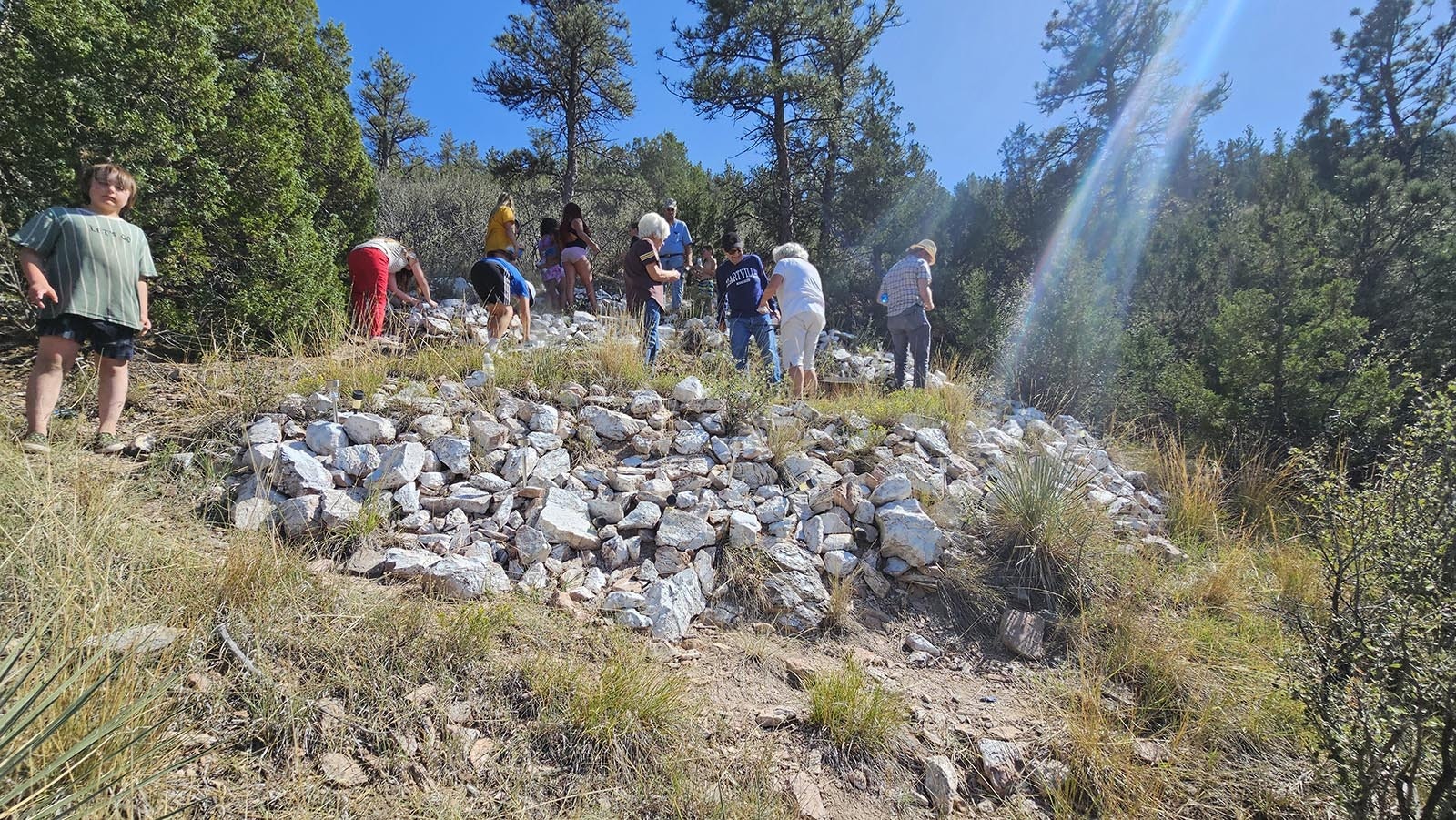 A dozen or so volunteers made the hike up the hill this year after the Labor Day parade to paint the Sunrise "S" white again. It's all part of keeping the spirit of Sunrise and its history alive.