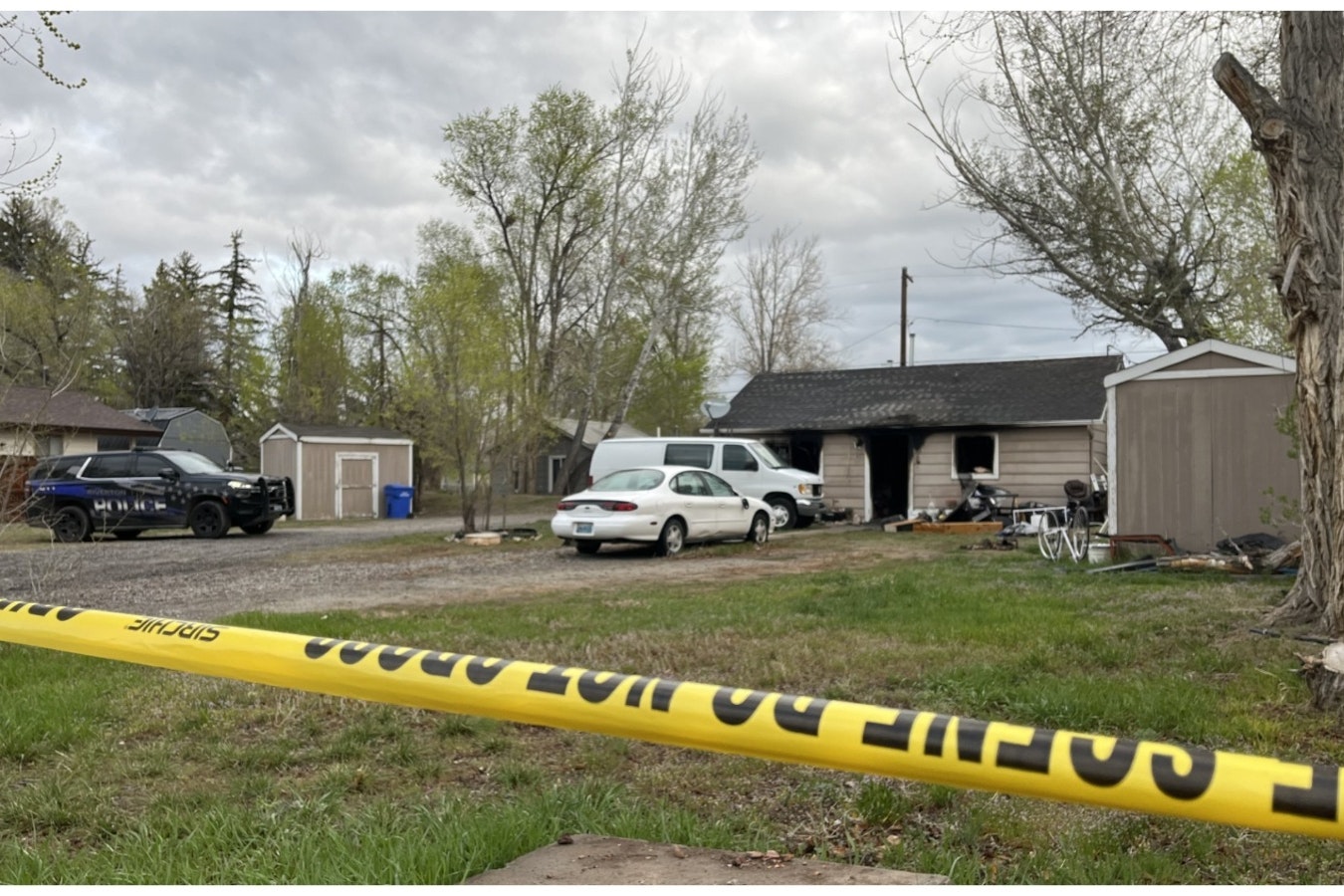 Rain misted on the charred Riverton home early Friday, five hours after emergency personnel found a deceased person inside it.