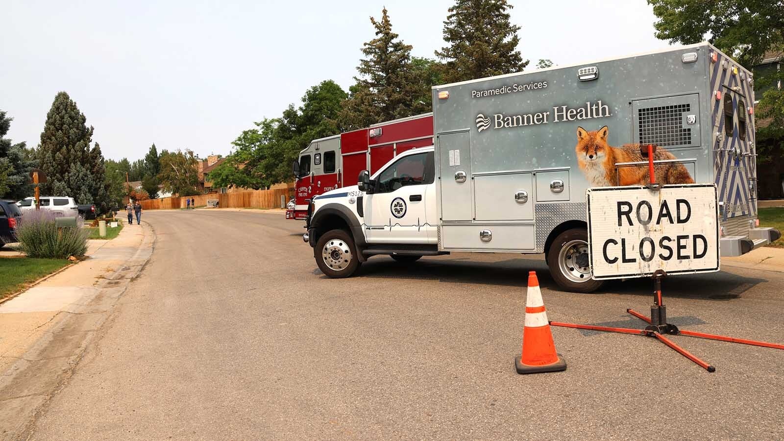 A Casper Fire Department truck and Banner Health ambulance block Indian Paintbrush Street on Casper’s southwest side.