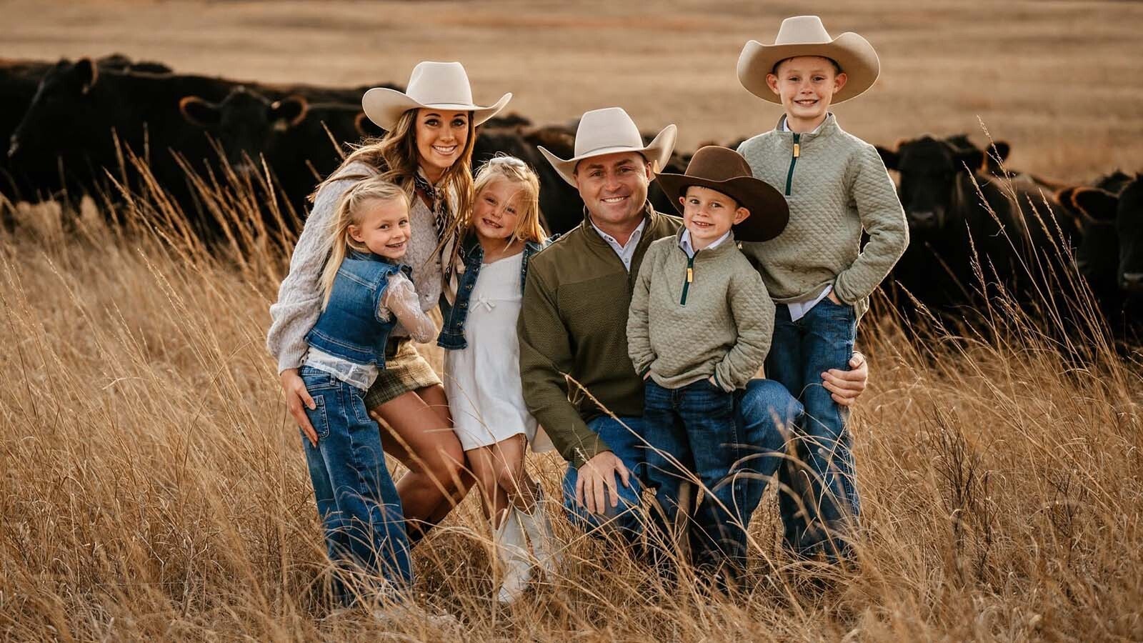 Trey Wasserburger with his wife Dayna and their children.