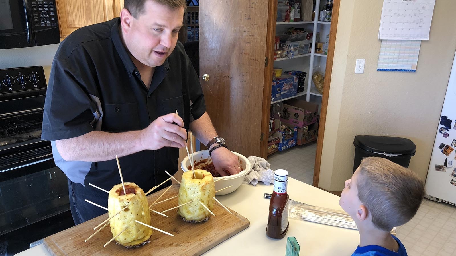 Jay Johnson, with a little help from his youngest son, Anthony, make up a couple of swineapples one year. They were not good.