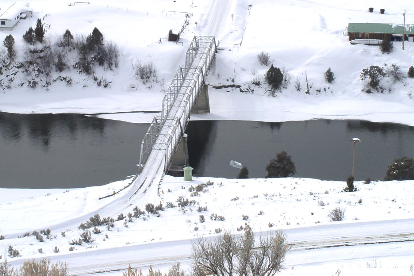 The Swinging Bridge near Jackson that spans the Snake River is being removed this week to make way for a new bridge. It's a local transportation icon that's been in place since 1960. Even then, it was built from repurposed trusses of the old Wilson River Bridge.