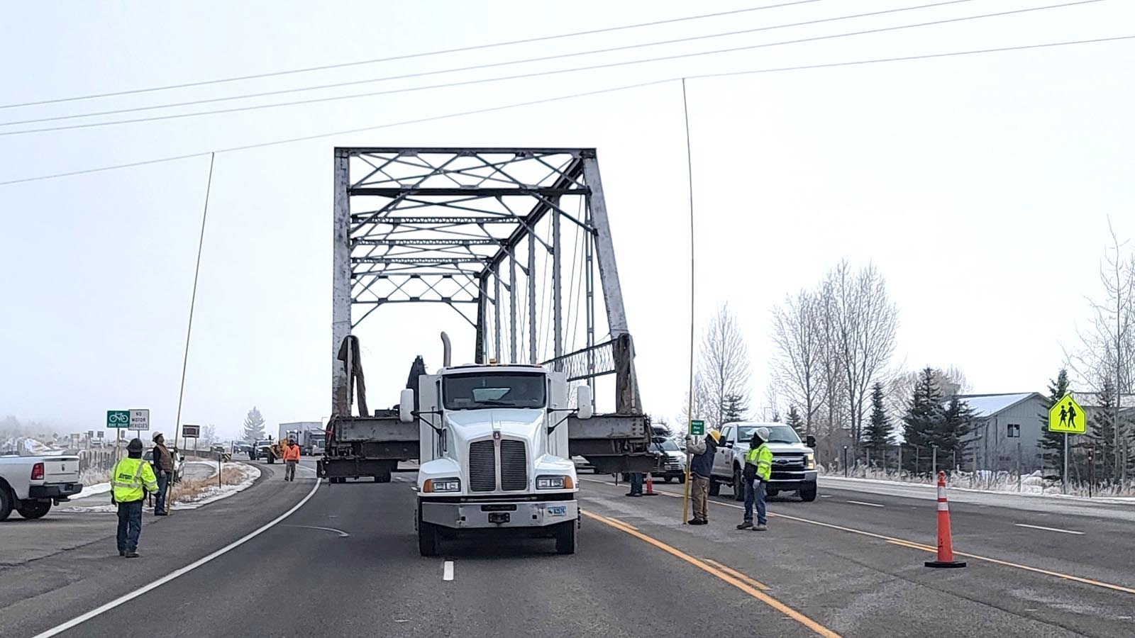 The steel structure of the old Swinging Bridge is removed to make way for a new bridge.