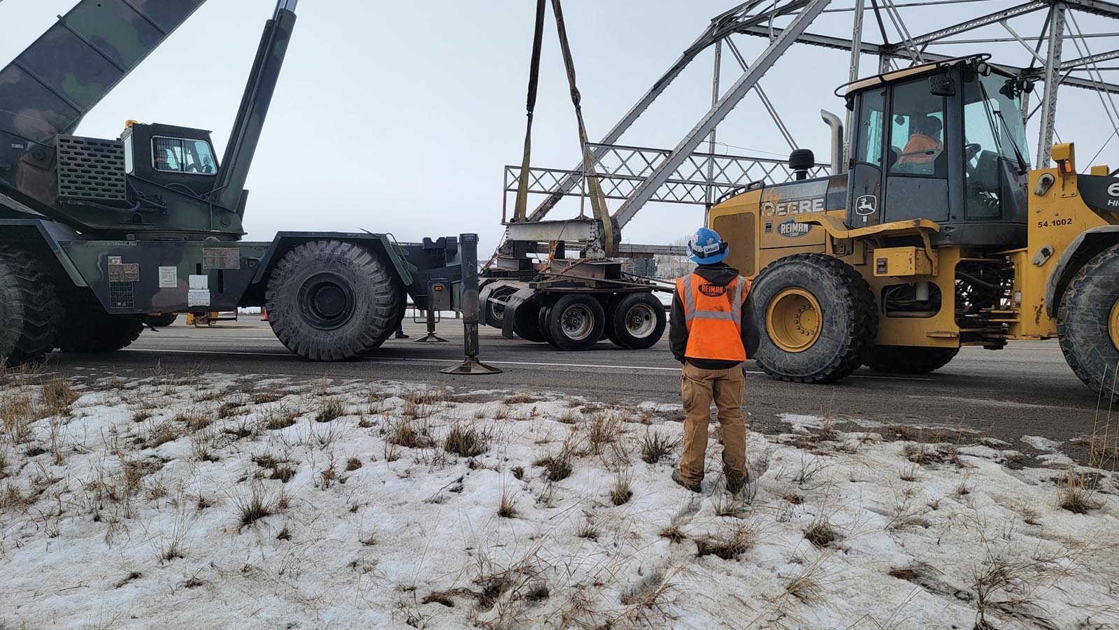 The steel structure of the old Swinging Bridge is removed to make way for a new bridge.