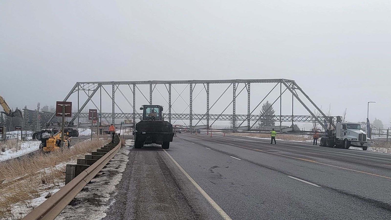 The steel structure of the old Swinging Bridge is removed to make way for a new bridge.