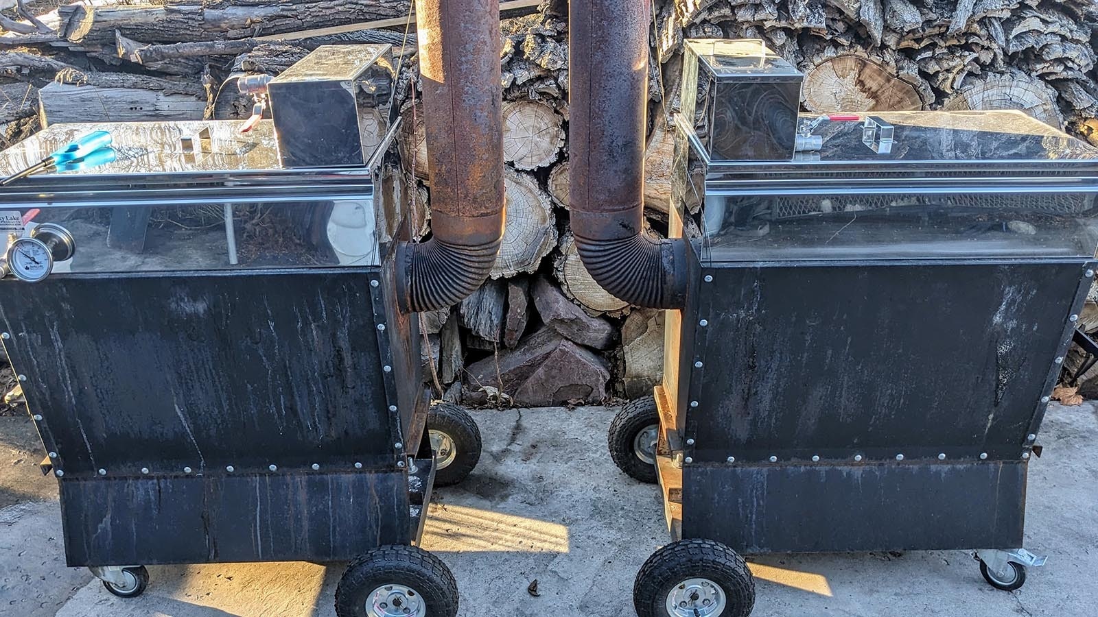 Two hobby-sized maple sap evaporators sit in David Knudson's driveway.