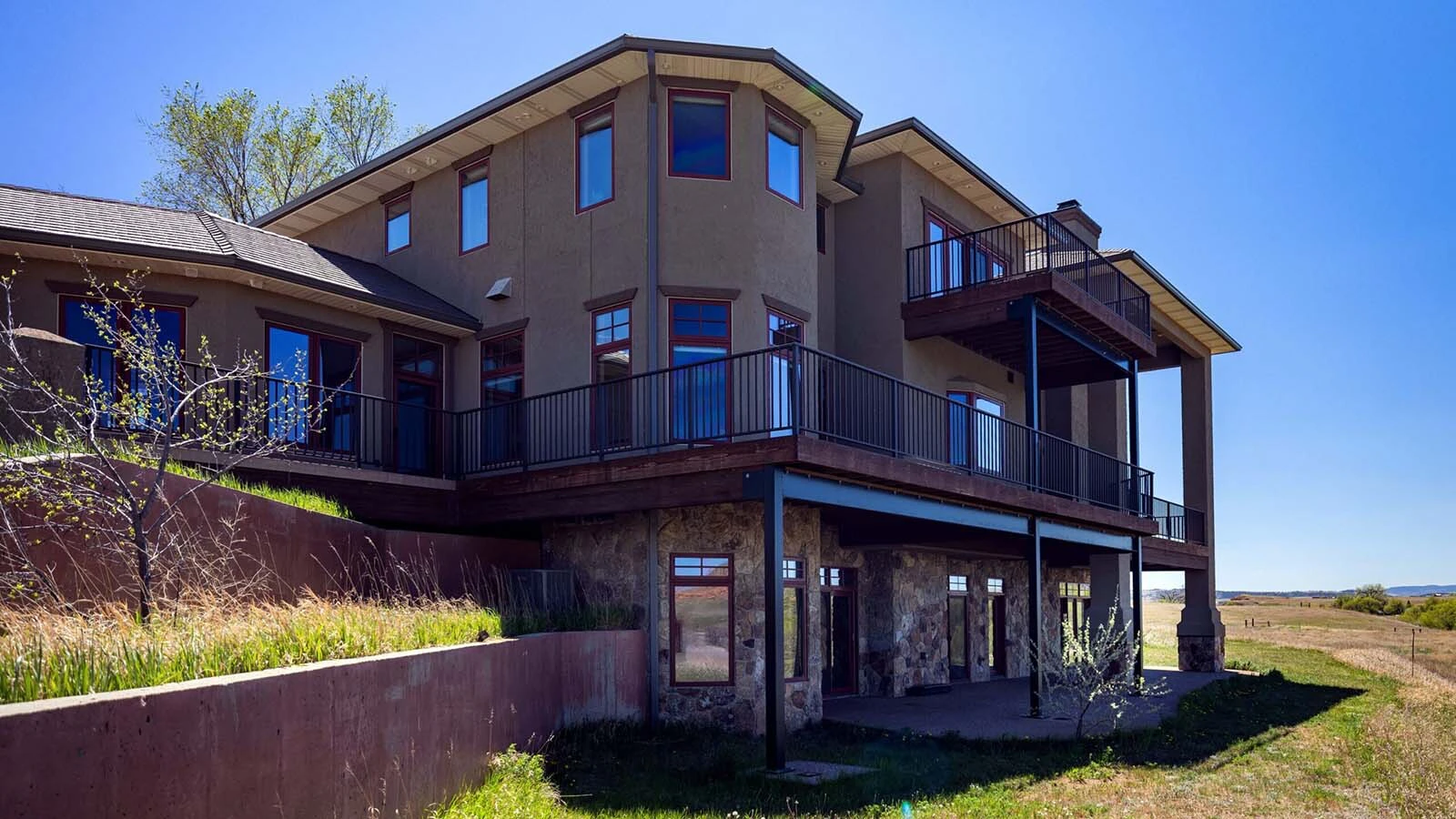A Crook County ranch with almost a century of history has hit the market for $5 million. It comes with a historic homestead, 7,500-square-foot mansion, a trout stream, views of red bluffs and access to the Black Hills of Wyoming and South Dakota. 