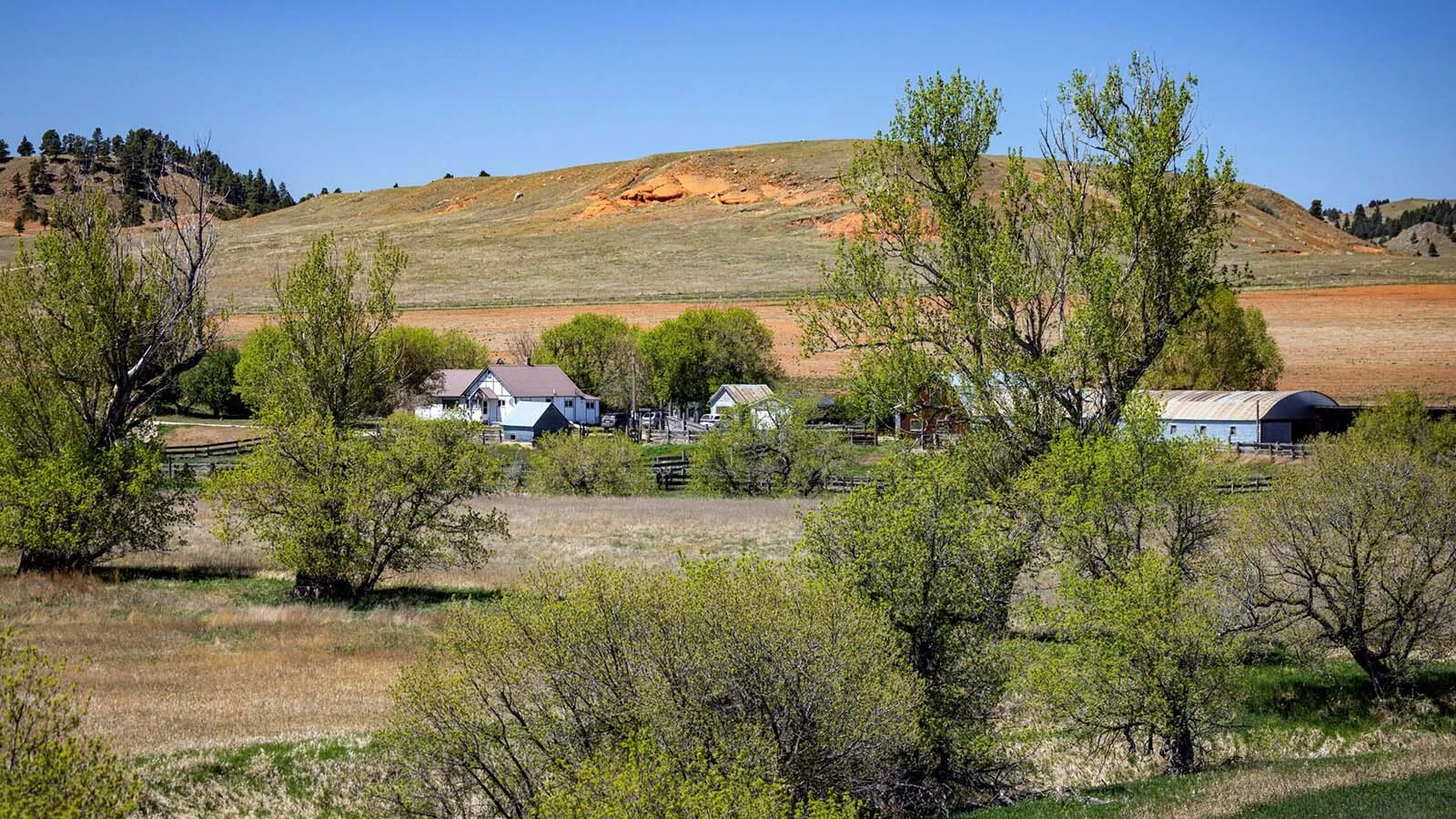 A Crook County ranch with almost a century of history has hit the market for $5 million. It comes with a historic homestead, 7,500-square-foot mansion, a trout stream, views of red bluffs and access to the Black Hills of Wyoming and South Dakota. 