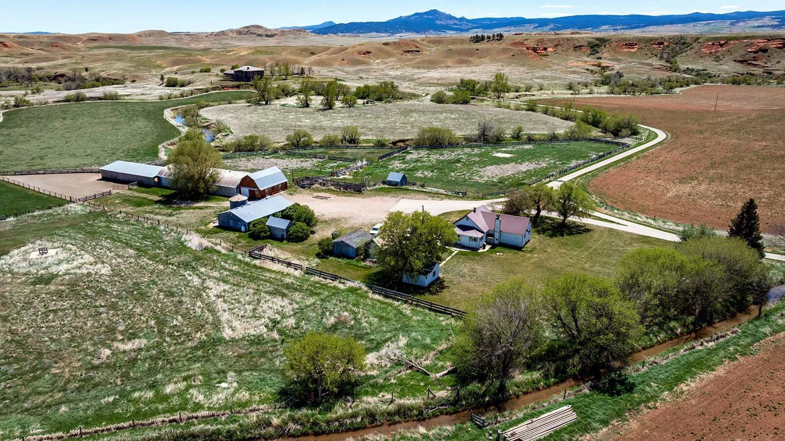 A Crook County ranch with almost a century of history has hit the market for $5 million. It comes with a historic homestead, 7,500-square-foot mansion, a trout stream, views of red bluffs and access to the Black Hills of Wyoming and South Dakota. 