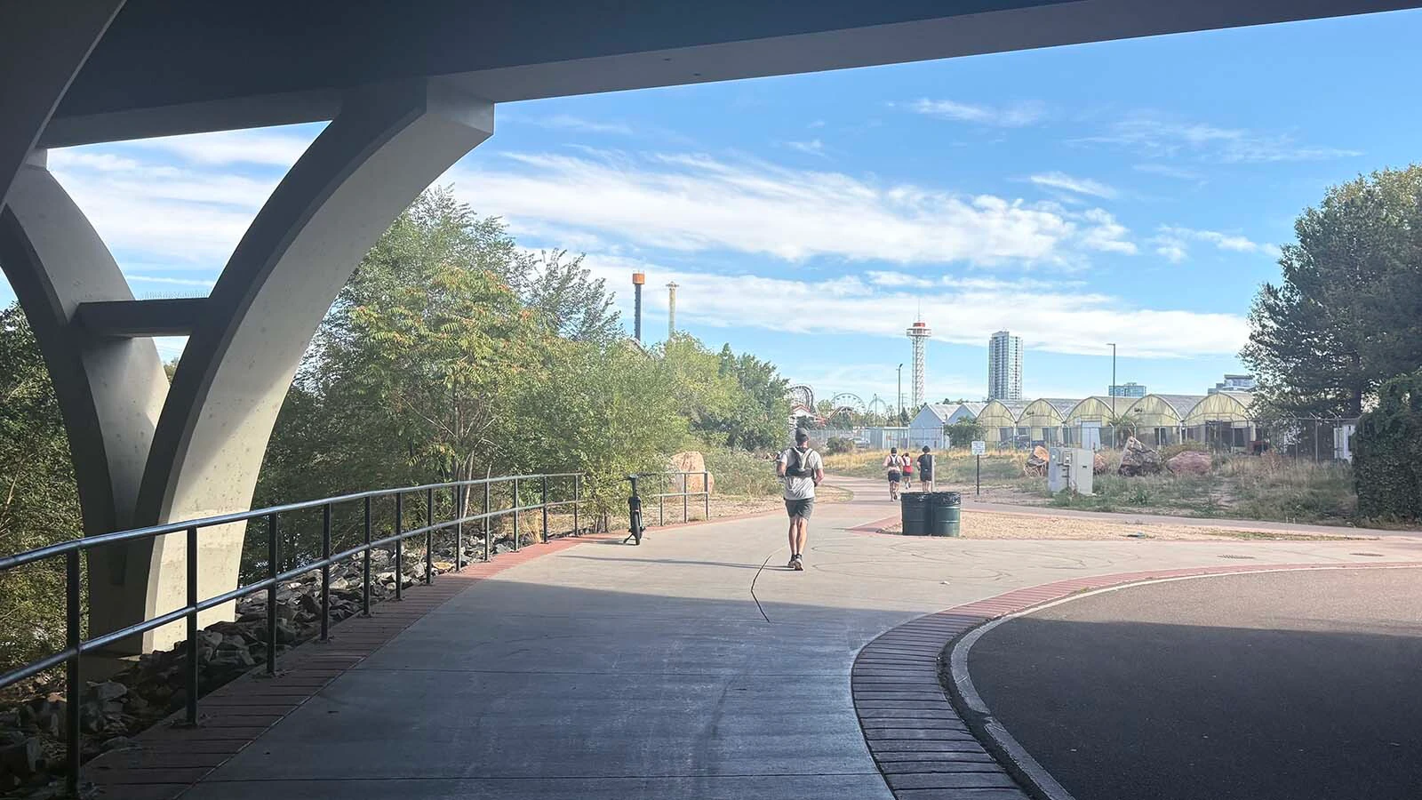 Emerging from an underpass at The Loco Strikes Back Taco Bell 50K ultramarathon in Denver on Saturday, Oct. 3, 2026, where runners have to make stops at 11 Taco Bells along a 31-mile run and eat a menu item at 10 of them.