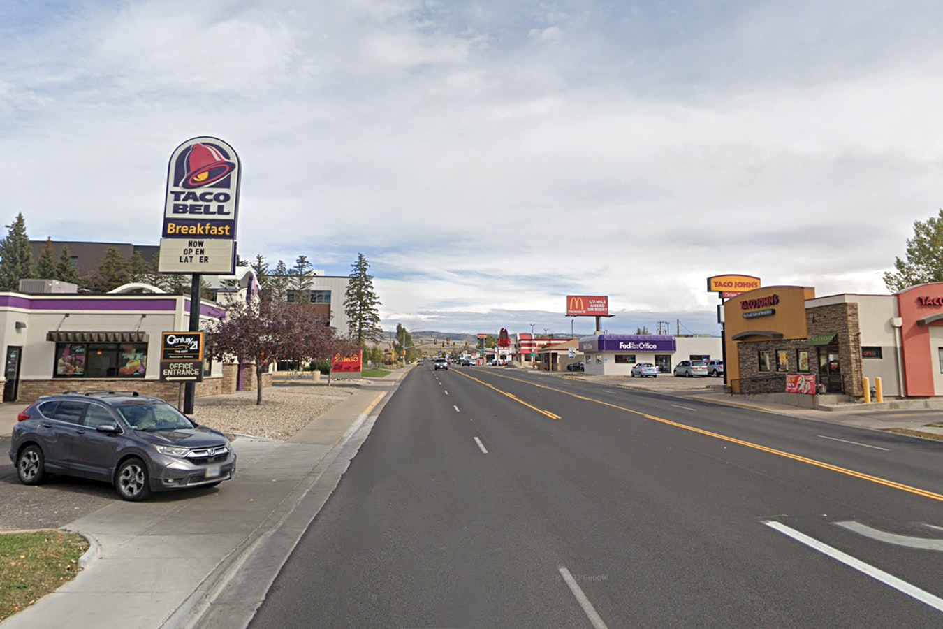 Not only are Taco Bell and Taco John's competitors, in many locations, they're neighbors as well, like in Laramie, where they have outlets across the street from each other along Grand Avenue.