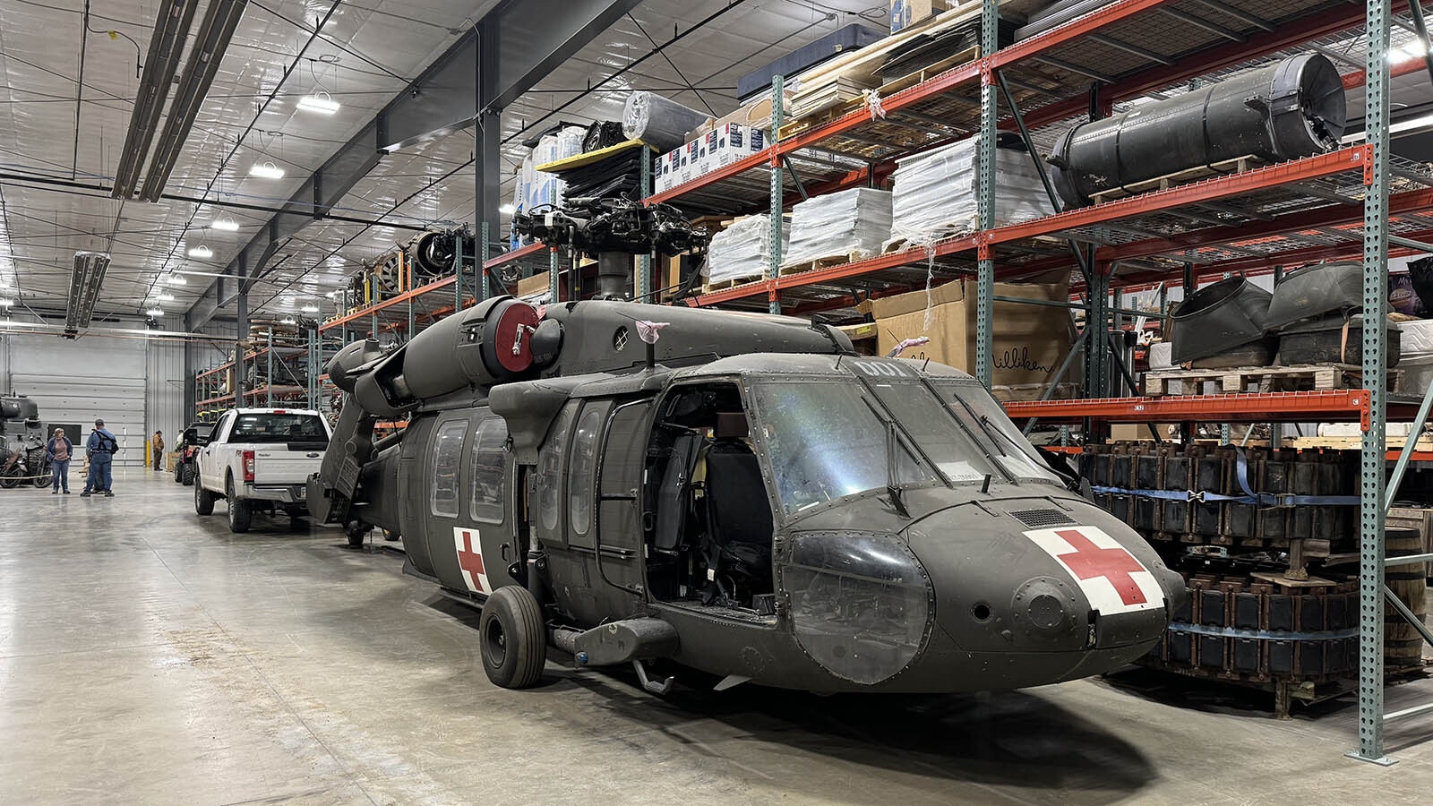A helicopter awaits its turn for restoration.
