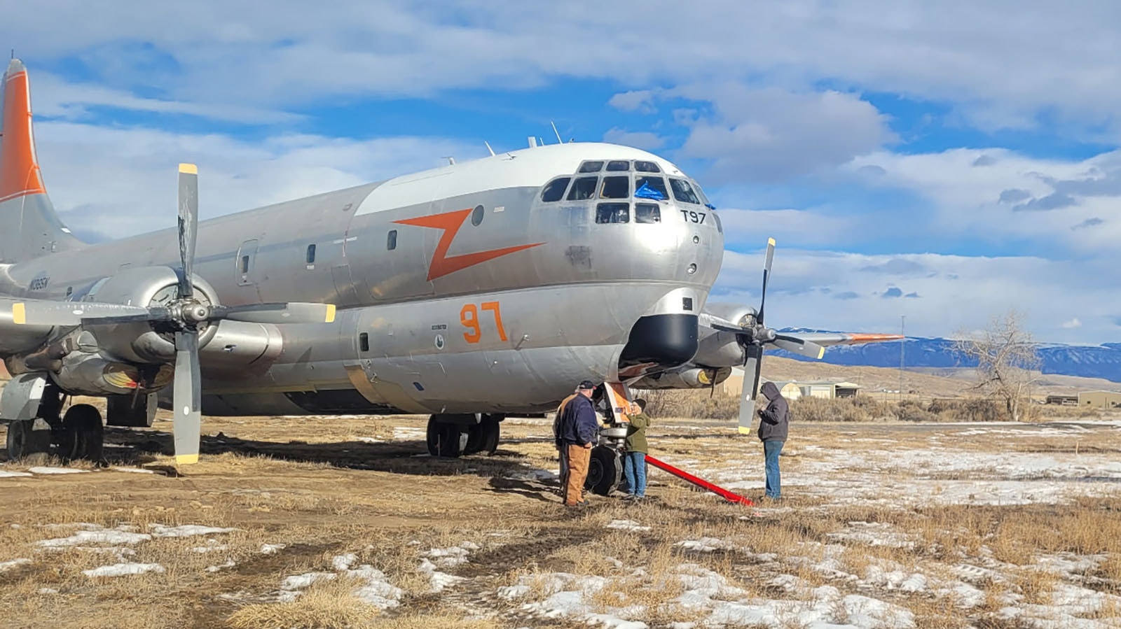 It took a team effort to move this Boeing KC-97 tanker to the grounds of the Museum of Flight and Aerial Firefighting, the Wyoming museum's largest aircraft. They had to wait for a cold snap so the ground would be frozen enough for the huge tanker to roll without sinking into the ground.