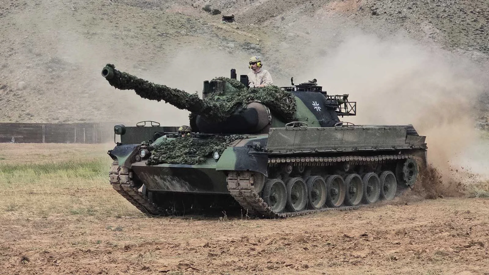 This 1981 Leopard tank runs 45 mph. It has no trouble climbing on top of obstacles, either.