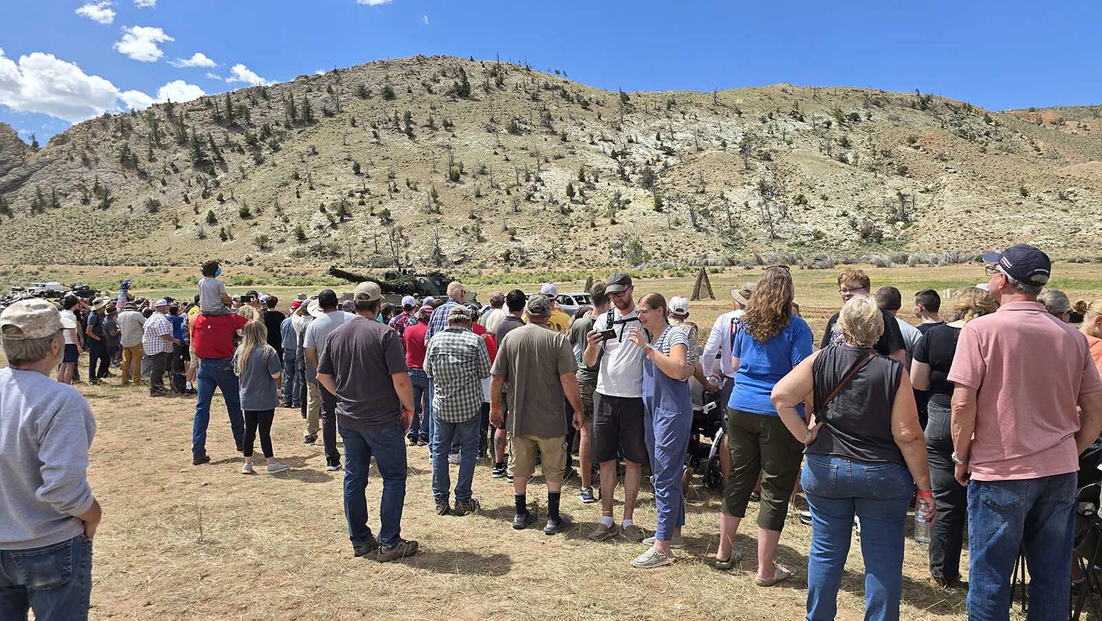 An appreciative crowd gathered to watch tanks crush cars at the National Museum of Military Vehicles on Friday. It was part of a day-long celebration of America.