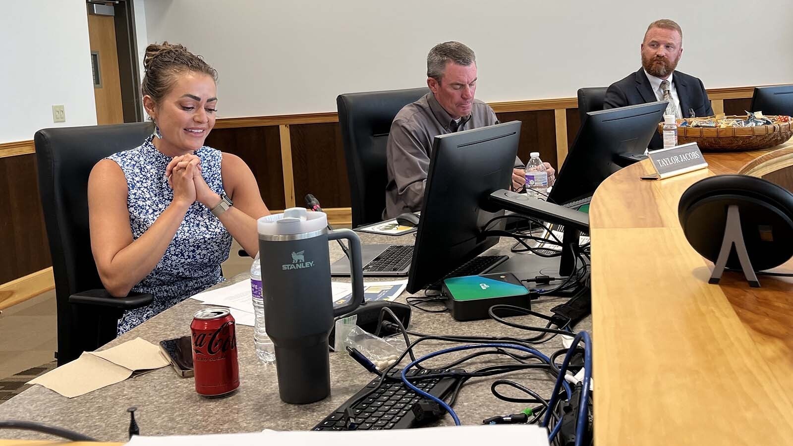 Fremont County School District 1 Board Treasurer Taylor Jacobs, left, member Mike McConnell and Vice-Chair Scott Jensen at a board meeting last year.