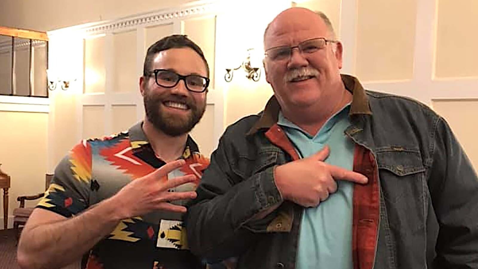 Former McCormick Junior High School student Mike Morris keeps a sign-flashing tradition alive with his American history teacher Eric Crock. They're friends 4 Life.