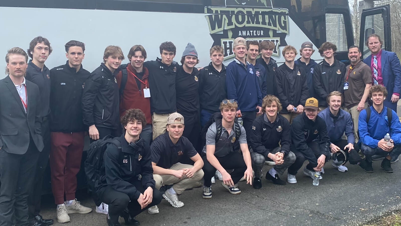 On the ride to the national championship, Team Wyoming’s Coach Laramie Davies, standing far right, said the team further bonded and took time to see a professional hockey game in Saint Louis.