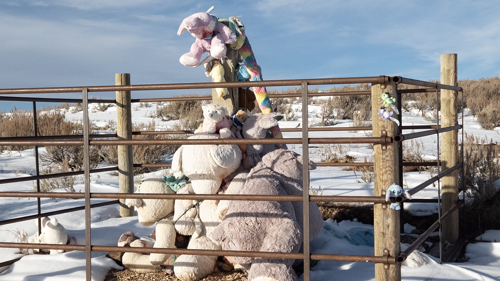 A recent group of local volunteers built a fence around Teddy Bear Corner and replaced its post, preserving the spot for another century.