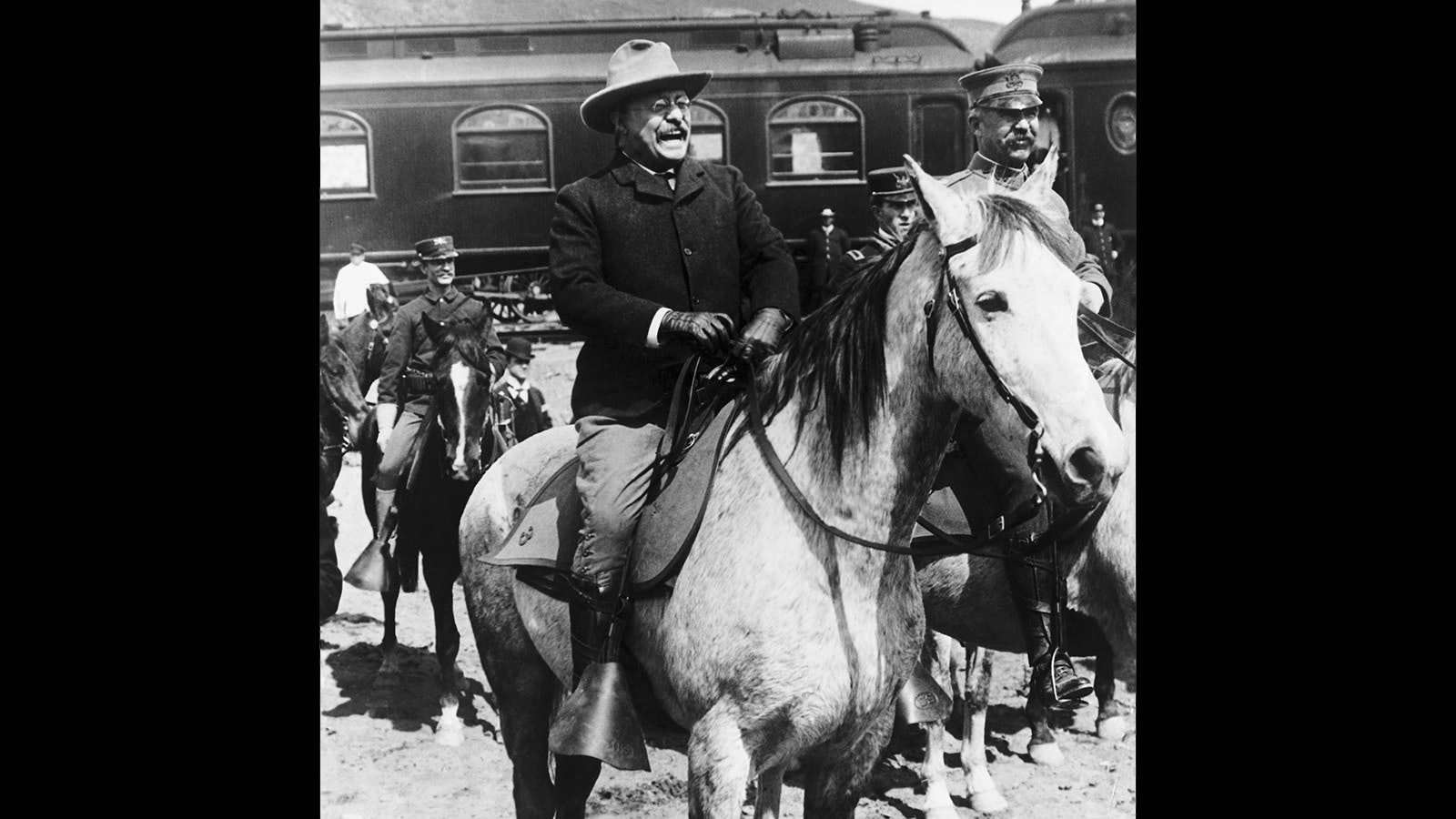 Teddy Roosevelt on horseback during a visit to Yellowstone National Park.
