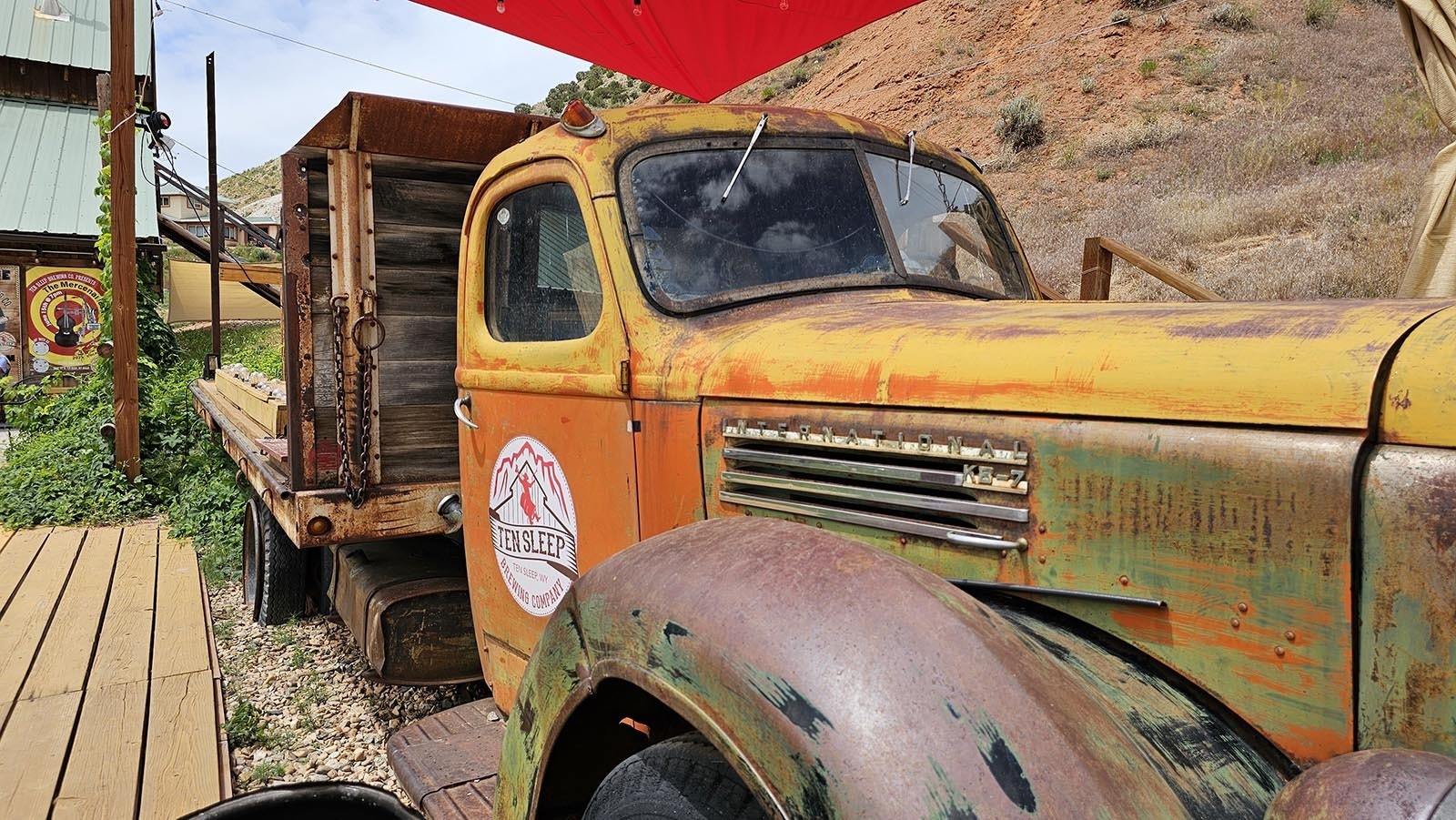 An old truck was used to create a functional stage, by building a new flatbed on the back.