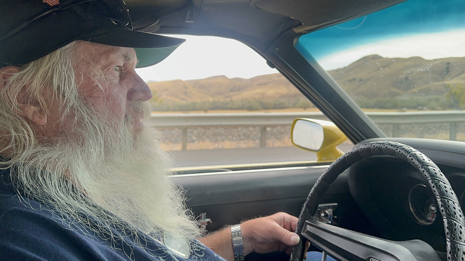 David Francis behind the wheel of his 1969 Mustang that he bought brand new on a trip to Denver. Although he had the money, his mom still had to put the title in her name because he was under 21.