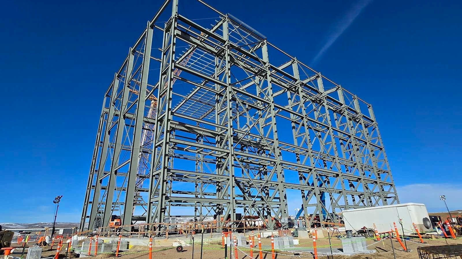 TerraPower is building a massive mechanic shop for its Natrium plant in Kemmerer, called the Test and Fill Facility. The crane behind the building is 200 feet tall, while the building is 167 feet tall.