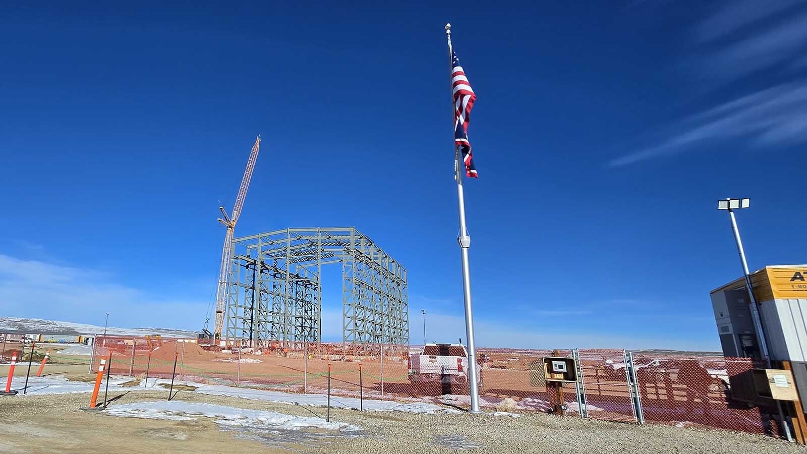 TerraPower is building a massive mechanic shop for its Natrium plant in Kemmerer, called the Test and Fill Facility. The crane behind the building reaches 200 feet tall, while the building is 167 feet tall.