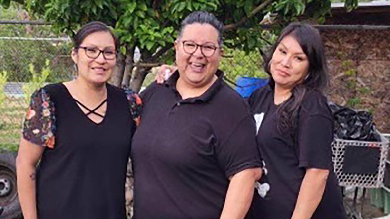 Terri Smith, from left, with her cousin Dena and twin sister Jerri.