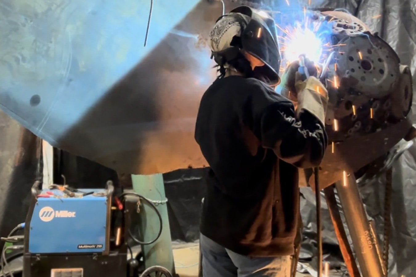 Jade Moser puts her welding talents to use on creating a huge 10-foot, 5,000-pound horse sculpture.
