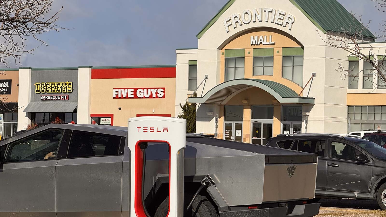 Wyoming started taxing electric vehicle drivers who plug into charging stations this month. Now a pro-EV group wants the new fee paused, saying it unfairly triple-taxes EV drivers. WYDOT says it's enforcing an existing law after broader EV reforms failed.