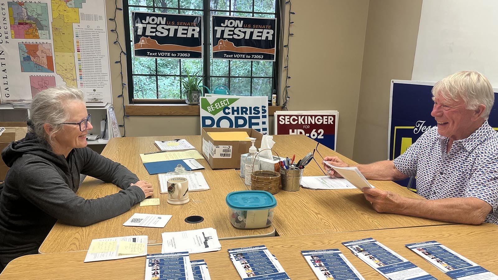 Gallatin County Democratic Party Chair Julia Shaida (left) and local volunteer Jerry Gossel talk campaign strategies at the county party’s offices in Bozeman.